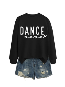 Detail of DANCE mama logo print on black sweatshirt with distressed denim shorts