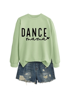 Detail of light green sweatshirt with DANCE mama print and blue distressed denim shorts