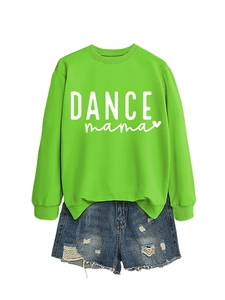 Detail of green crewneck sweatshirt featuring white Dance Mama print and irregular hemline