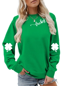 Detail of lucky lettering and clover prints on sleeves of a bright green sweatshirt