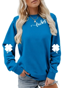 Close-up of lucky text and clover prints on blue long-sleeved casual sweatshirt sleeves