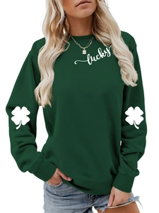 Detail of lucky clover prints on sleeves and white text on dark green sweatshirt