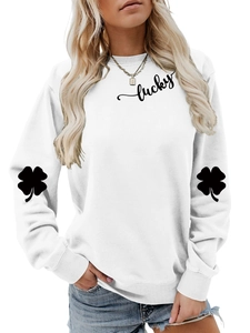 Close-up of lucky text and shamrock sleeve prints on this white round neck sweatshirt