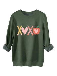 Detail showing the thick grey fleece lining inside the dark green XOXO sweatshirt
