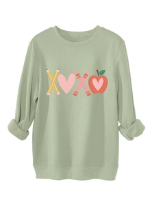 Detail of sage green ribbed crewneck sweatshirt featuring XOXO teacher graphic print