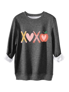Detail of grey sweatshirt showing warm white fleece lining and creative XOXO graphic print