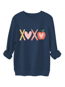 Detail of navy blue sweatshirt showing ribbed cuffs and creative XOXO school graphic