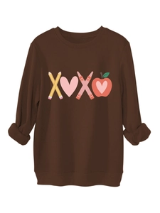 Detailed view of the XOXO graphic print on the brown plush crewneck sweatshirt