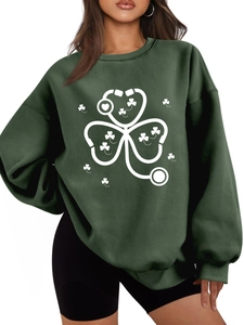 Detail of St. Patrick's clover stethoscope print on thick dark green women's sweatshirt