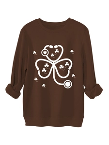 Detail view of the clover stethoscope print on the thick warm dark brown sweatshirt