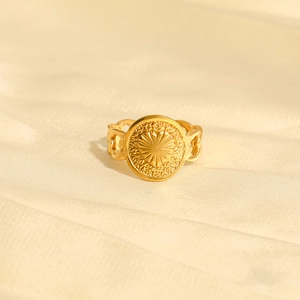 Retro gold stainless steel ring featuring heart sunburst seal and chain-link band design