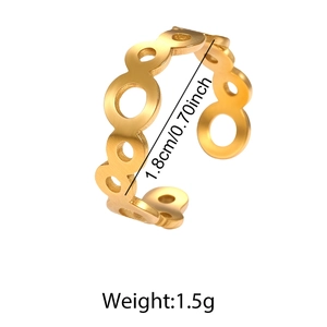 Macro detail of golden stainless steel adjustable ring showing 1.8cm diameter and weight