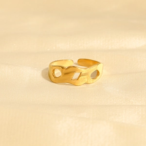 Irregular wave-shaped hollow gold-plated open ring with geometric cutouts and polished finish