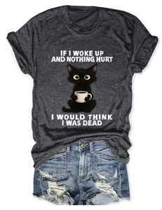 Detail view of cotton t-shirt with funny cat print and denim shorts outfit set