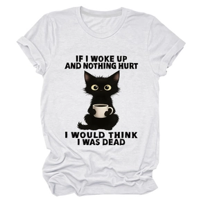 Detail of white cotton T-shirt featuring a cartoon black cat holding a coffee cup graphic
