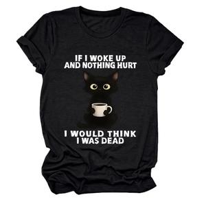 Detail of cartoon cat printing and humorous text on black women's cotton t-shirt