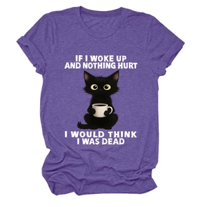 Detail of purple graphic tee showing gray heather texture and cartoon cat print
