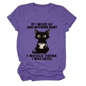 Detail of cartoon cat graphic with witty slogan printed on purple cotton t-shirt