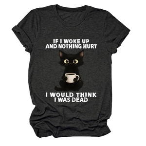 Detail of funny cartoon cat print and white text on charcoal grey cotton t-shirt