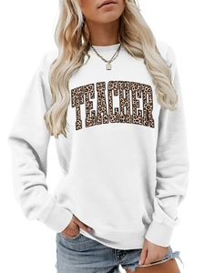 Detail of white sweatshirt featuring teacher letter print with leopard texture pattern