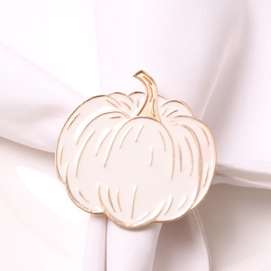 White enamel pumpkin napkin ring with gold plated metal edges for Halloween table decor