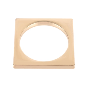 Minimalist square geometric napkin ring in rose gold finish with polished metal surface