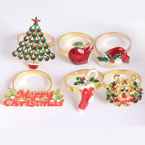 Set of 6 Christmas napkin rings featuring tree, snowman and reindeer designs