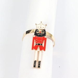Nutcracker soldier napkin ring in red and gold finish for elegant table settings