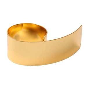 Minimalist spiral napkin ring in golden metal finish for luxury table settings