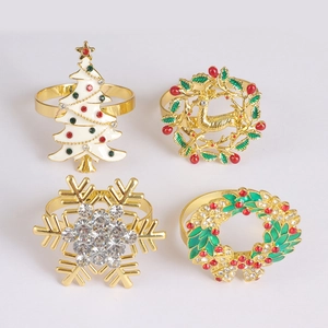 Christmas napkin ring set with enamel tree, elk, snowflake and wreath metal designs