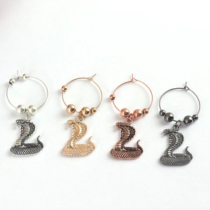 Gothic snake wine glass charms in gold, silver, rose gold and black metal finishes