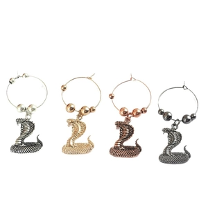 Exaggerated snake-shaped wine glass charms in four colors for Halloween party decorations