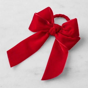 Elegante servilletero festivo de lazo de terciopelo rojo para decoración de Navidad