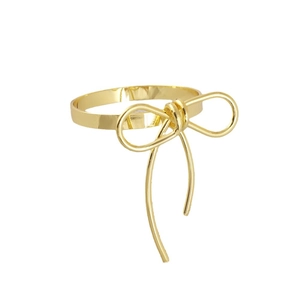 Elegant gold bow napkin ring with thin wire design and hanging metal tassels for table decor