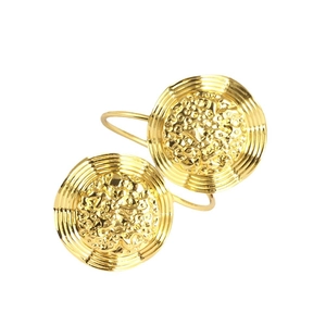 Exaggerated vintage gold flower napkin ring with unique textured metal relief design