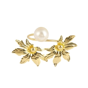 Elegant gold double leaf napkin ring with a central white pearl for wedding table decor
