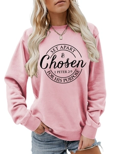 Detailed close-up of ribbed cuffs and pink cotton fabric texture on women's sweatshirt