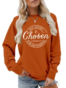 Detail view of round neck bright orange sweatshirt with white 1 PETER 2:9 scripture print