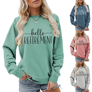Detail of hello retirement printed sweatshirt in mint, blue, pink and gray colors