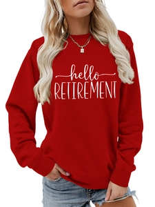 Detail of the high-quality white hello RETIREMENT print on red cotton sweatshirt