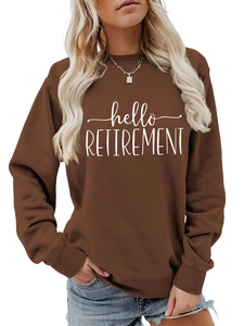 Detail of Hello Retirement white graphic print on brown long sleeve crewneck sweatshirt