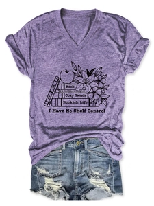 Detailed close-up of V-neck cotton T-shirt with book and flower artistic print