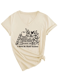 Detail of beige V-neck t-shirt featuring book theme illustration and front knot style