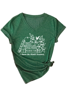 Detail of dark green V-neck T-shirt with book and flower print and tied hem design