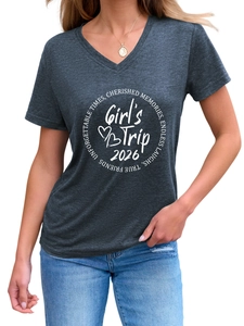 Detail of V-neck short sleeve T-shirt with Girl's Trip 2026 print on dark gray fabric