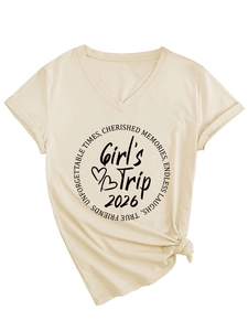 Detail of V-neck apricot T-shirt with Girl's Trip 2026 print and front knot detail