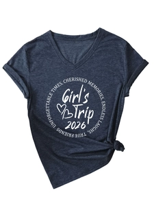 Detail of V-neck T-shirt in dark blue with Girl's Trip 2026 print and front knot detail