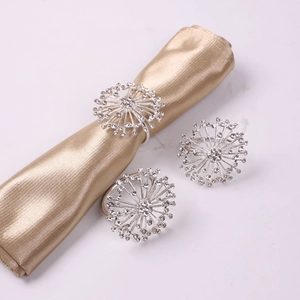 Three-piece set of silver firework napkin rings with crystal rhinestones for weddings
