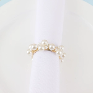 Elegant pearl and gold wire woven napkin ring for banquet table decoration and weddings