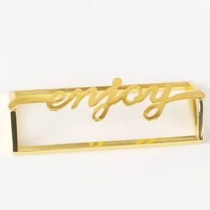 Gold hollow rectangular napkin ring with artistic Enjoy lettering for table decor